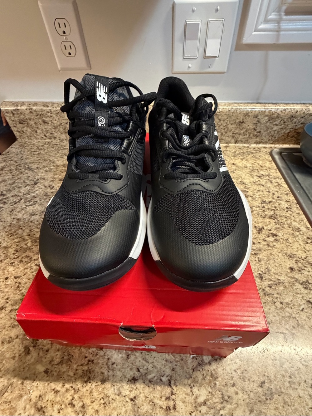 New Balance Black and White Athletic Sneakers